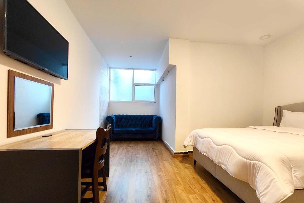 Postel nebo postele na pokoji v ubytování Villa Mirasol Hotel