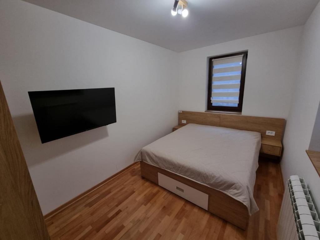 Postel nebo postele na pokoji v ubytování HedoNik Divčibare