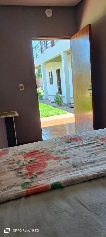 Postel nebo postele na pokoji v ubytování HOSPEDAJE SAN JUAN