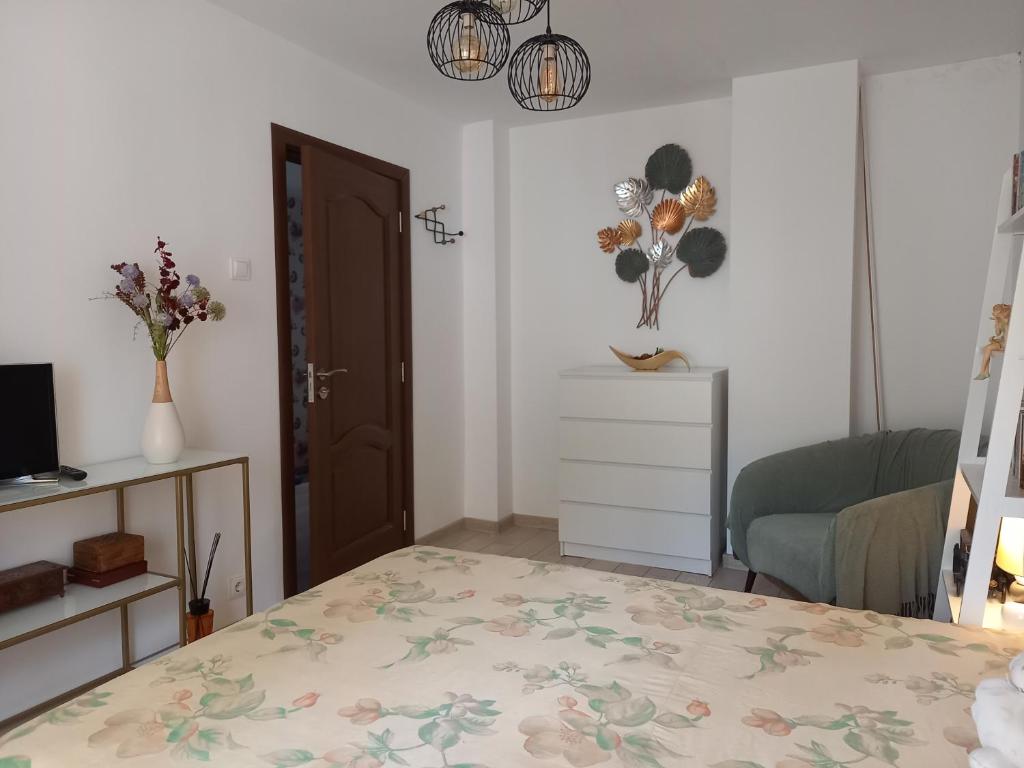 Postel nebo postele na pokoji v ubytování Apartament Elena