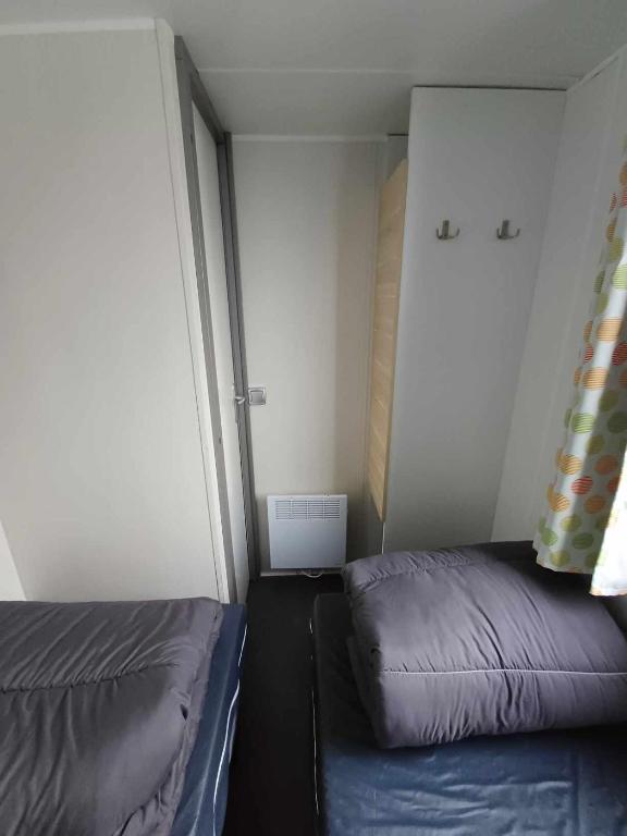 Postel nebo postele na pokoji v ubytování Dépaysement sur Le Portel