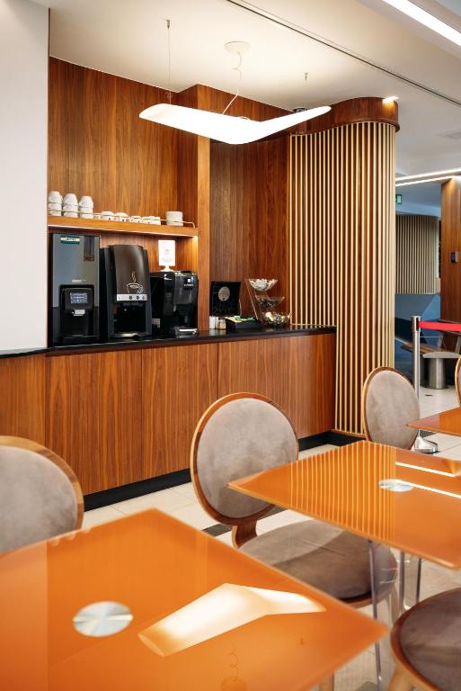 Kuchyň nebo kuchyňský kout v ubytování Kastro Hotel