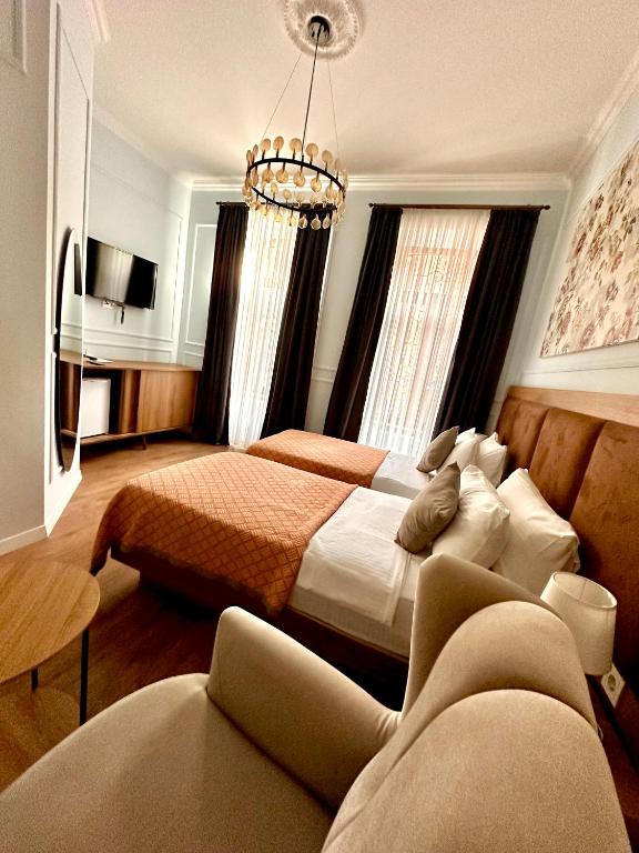 Postel nebo postele na pokoji v ubytování Hotel Wine Time Tbilisi