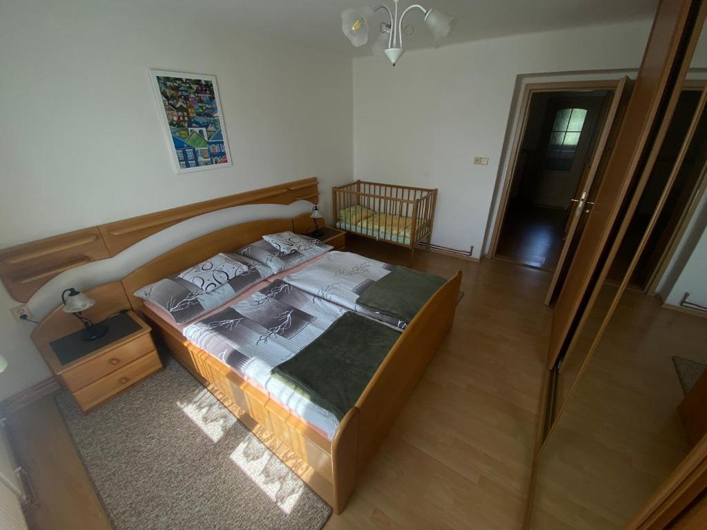 Postel nebo postele na pokoji v ubytování Apartment Bajt
