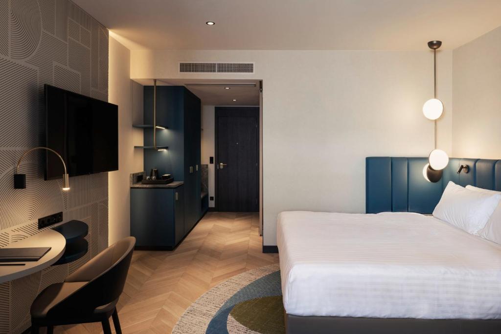 Postel nebo postele na pokoji v ubytování Luxembourg Marriott Hotel Alfa