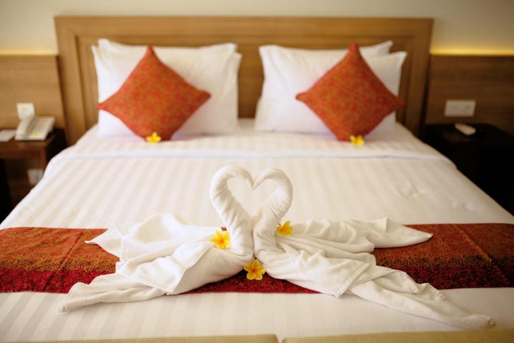 Кровать или кровати в номере Paragon Hotel Seminyak