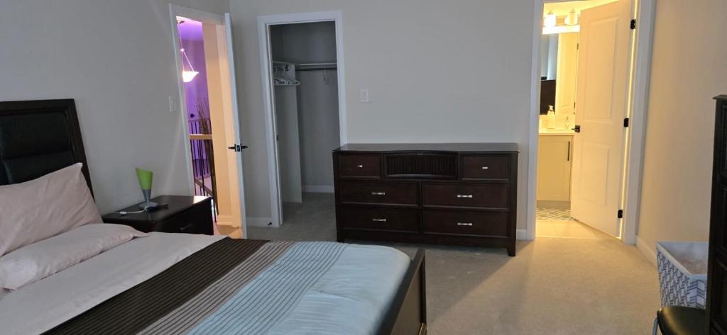 Ένα ή περισσότερα κρεβάτια σε δωμάτιο στο Pearl Properties