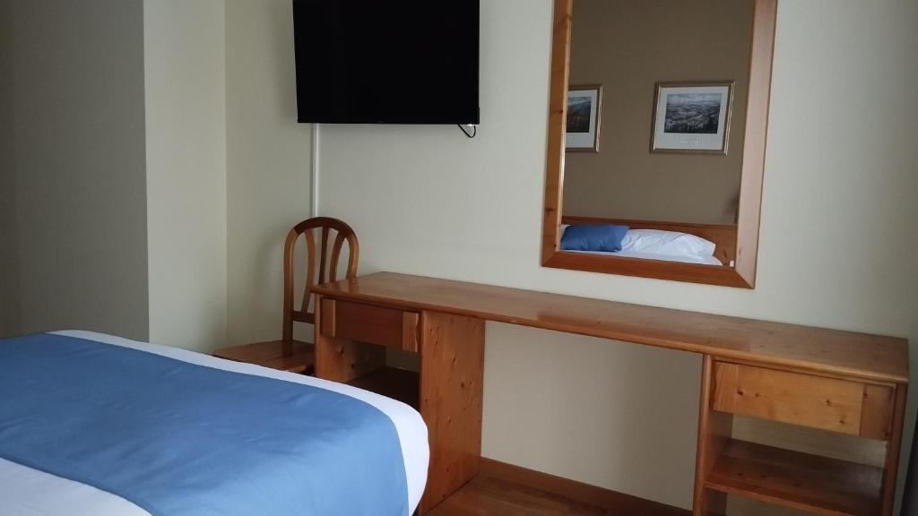 Postel nebo postele na pokoji v ubytování Hotel Covaleda Soria