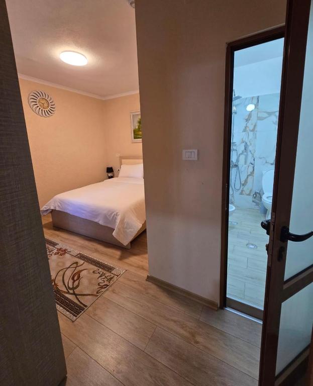 Postel nebo postele na pokoji v ubytování Oasis