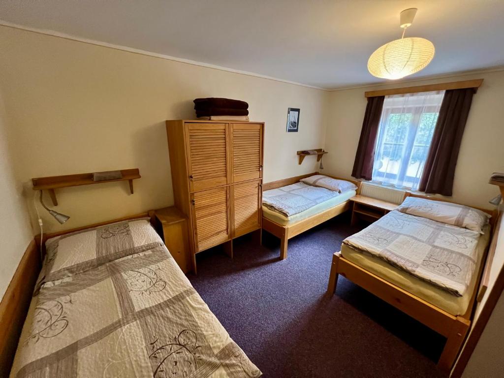 Postel nebo postele na pokoji v ubytování Hostel Postel