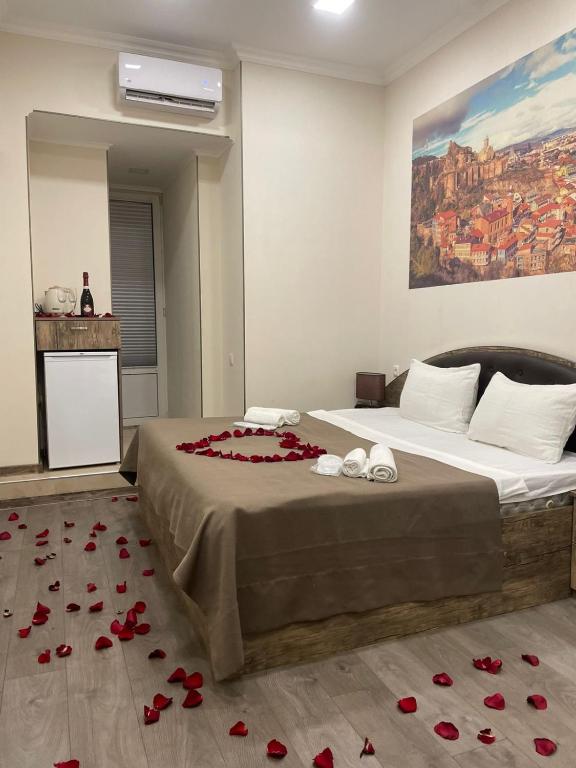 Postel nebo postele na pokoji v ubytování Sweet Rooms Inn