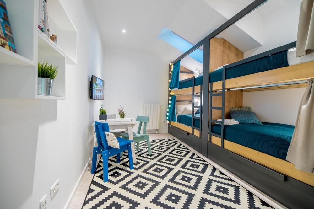 Ένα ή περισσότερα κρεβάτια σε δωμάτιο στο Hostel Sokol Centar