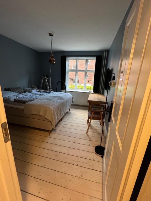 Postel nebo postele na pokoji v ubytování Byhuset Vejle