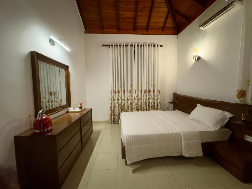 Postel nebo postele na pokoji v ubytování Liyara Villas