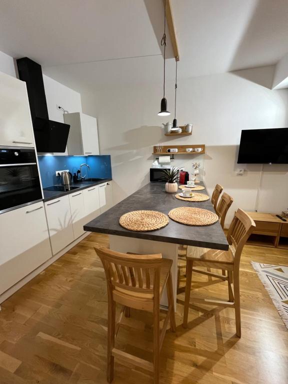 Kuchyň nebo kuchyňský kout v ubytování Slunečný apartmán
