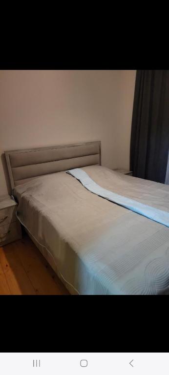 Ένα ή περισσότερα κρεβάτια σε δωμάτιο στο guest house TSVARA