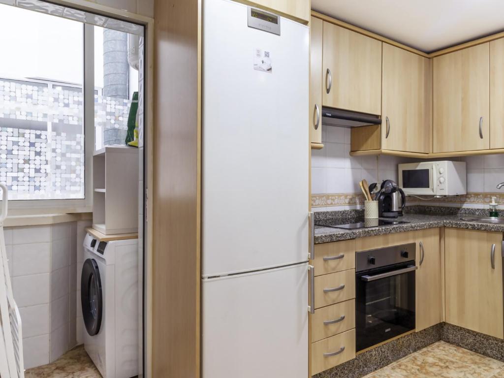 Kuchyňa alebo kuchynka v ubytovaní Apartamento Pink Medsea
