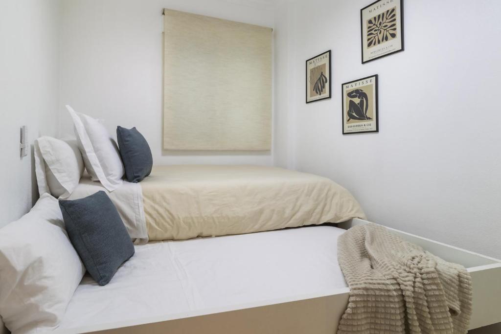 Posteľ alebo postele v izbe v ubytovaní Apartamento Pink Medsea