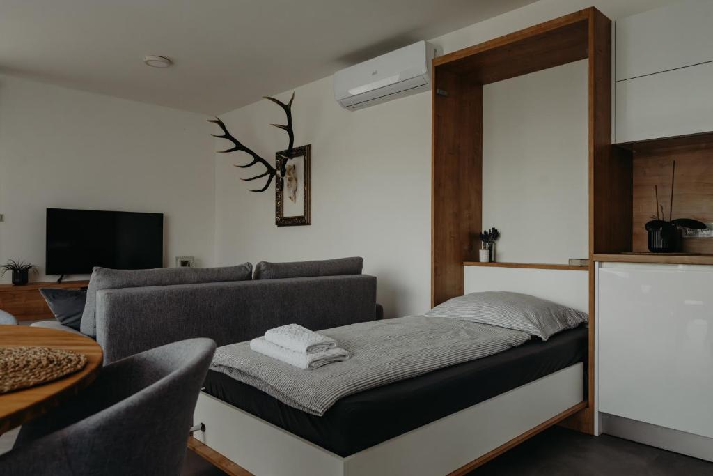 Postel nebo postele na pokoji v ubytování Apartmán Ústí