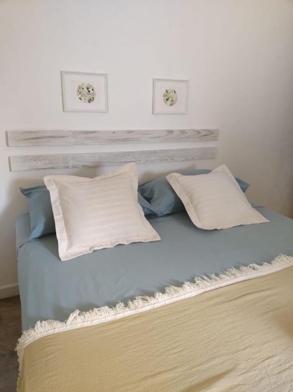 Postel nebo postele na pokoji v ubytování Quédate Aquí
