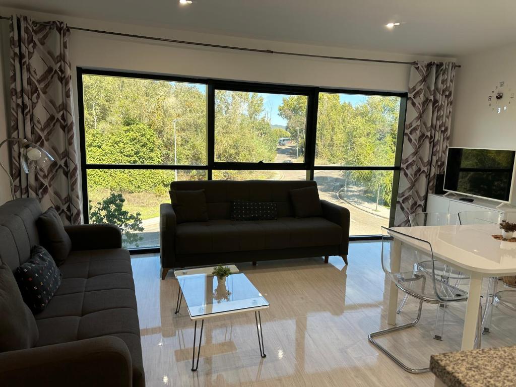 Posezení v ubytování TECNOCORDOBA aparcamiento privado gratuito y piscina