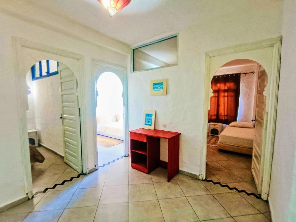Tempat tidur dalam kamar di P1 duplex vue sur Mer