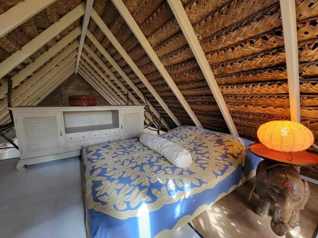 Posezení v ubytování LOFT VANILLE avec clim et piscine partagee