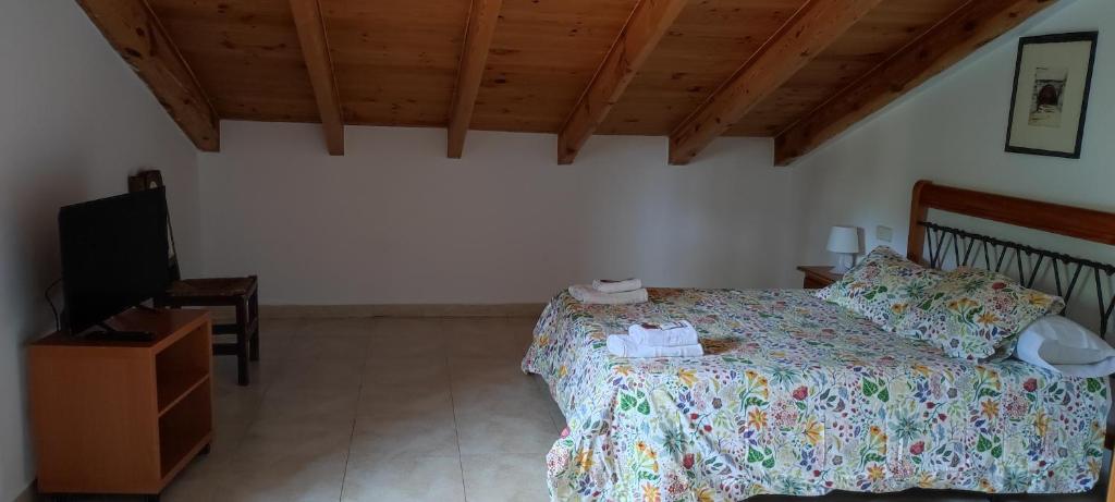 Postel nebo postele na pokoji v ubytování ALTOGREDOS Hotel Rural y apartamentos turísticos