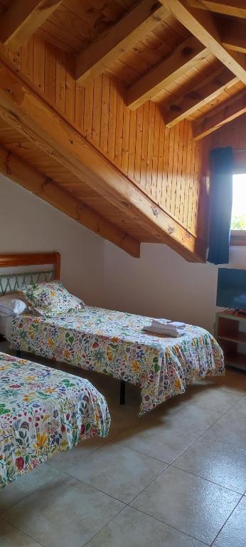 Postel nebo postele na pokoji v ubytování ALTOGREDOS Hotel Rural y apartamentos turísticos