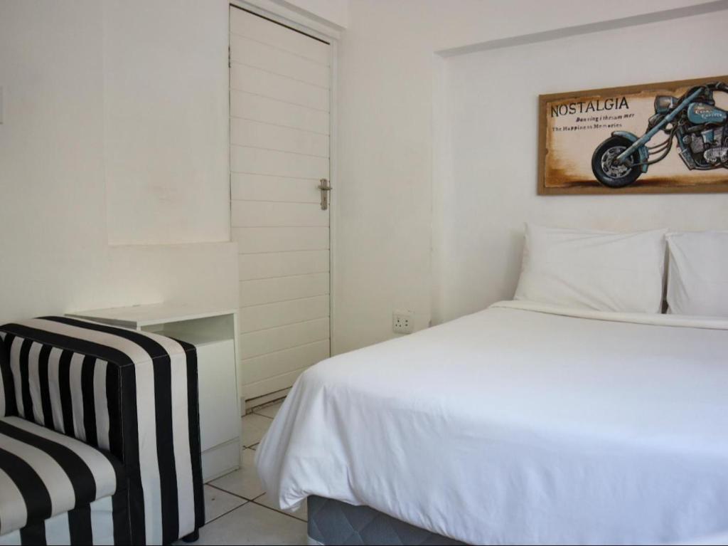 Letto o letti in una camera di Casa Palmeira