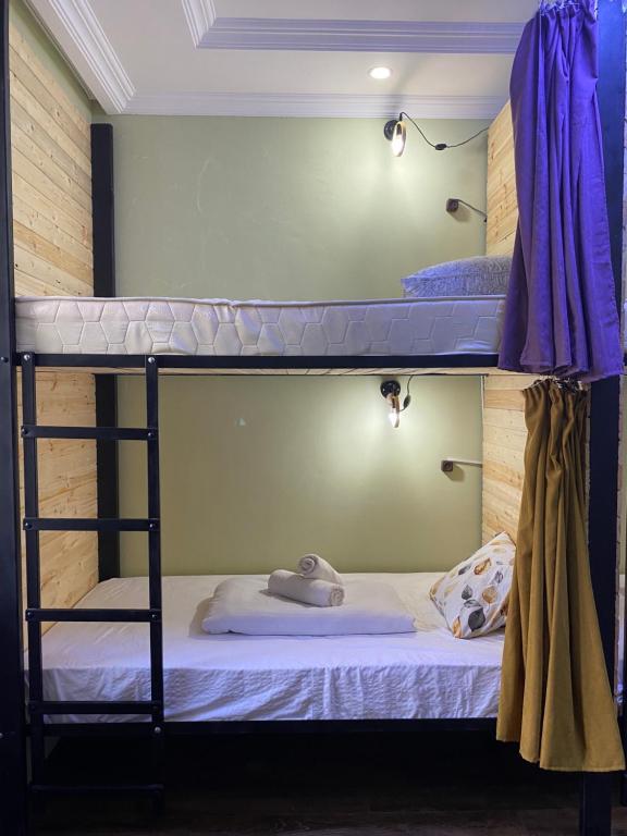 Postel nebo postele na pokoji v ubytování Relax Station