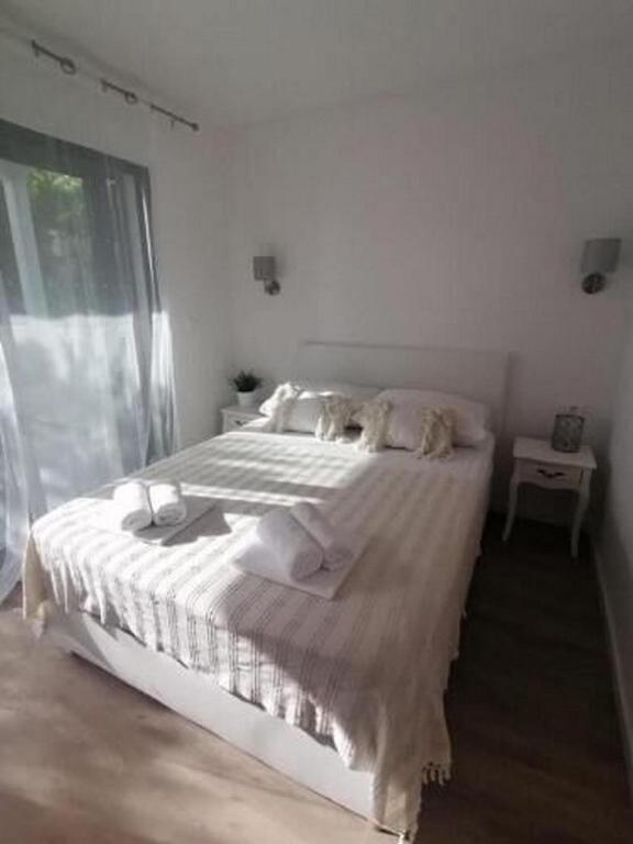 Postel nebo postele na pokoji v ubytování Apartments Diana Lovetovo