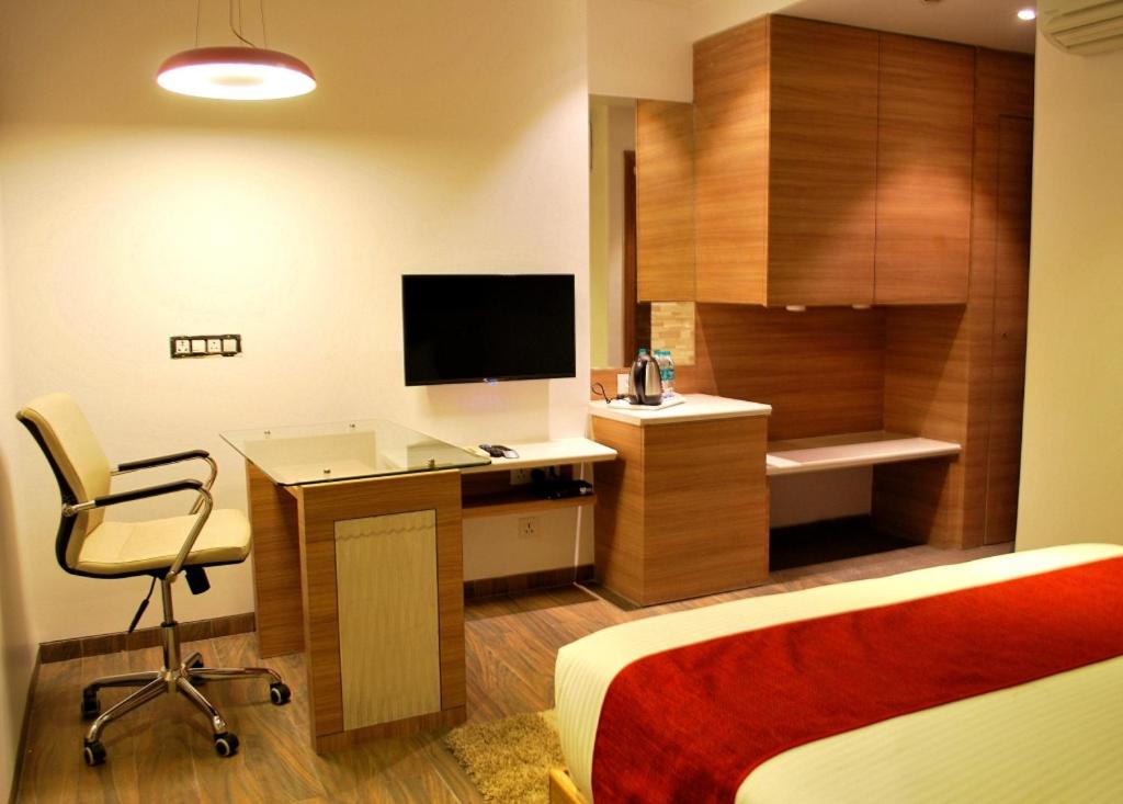 TV a/nebo společenská místnost v ubytování Urban Hermitage
