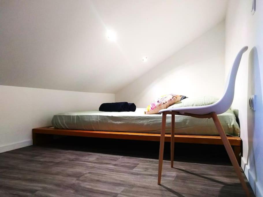 Posteľ alebo postele v izbe v ubytovaní Le Cours Foucault - 3 appartements - 8 couchages