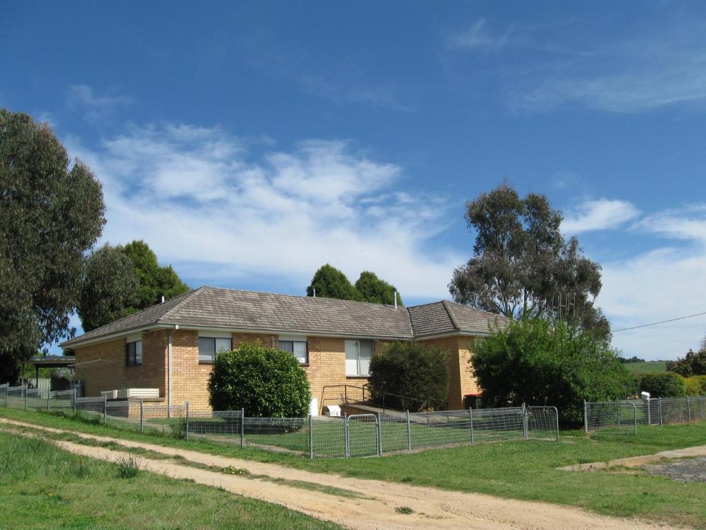 a house on the side of a dirt road at Hayden House in Delegate