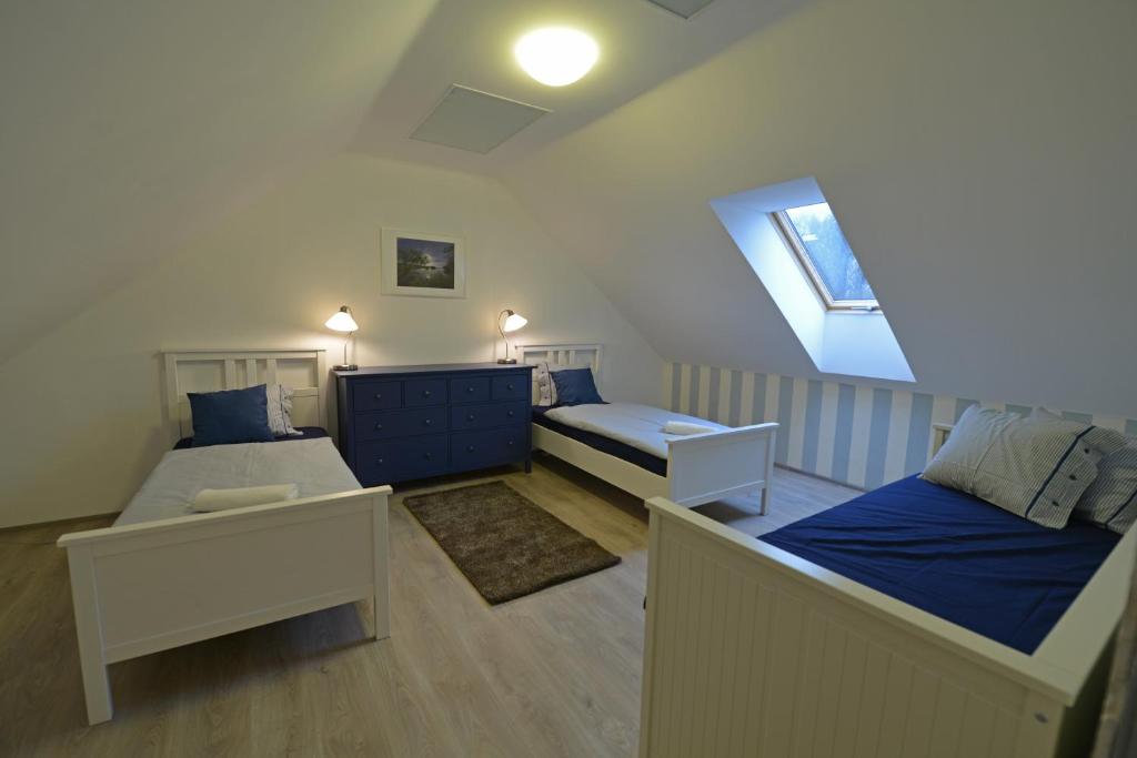 Postel nebo postele na pokoji v ubytování Apartmány Belveder