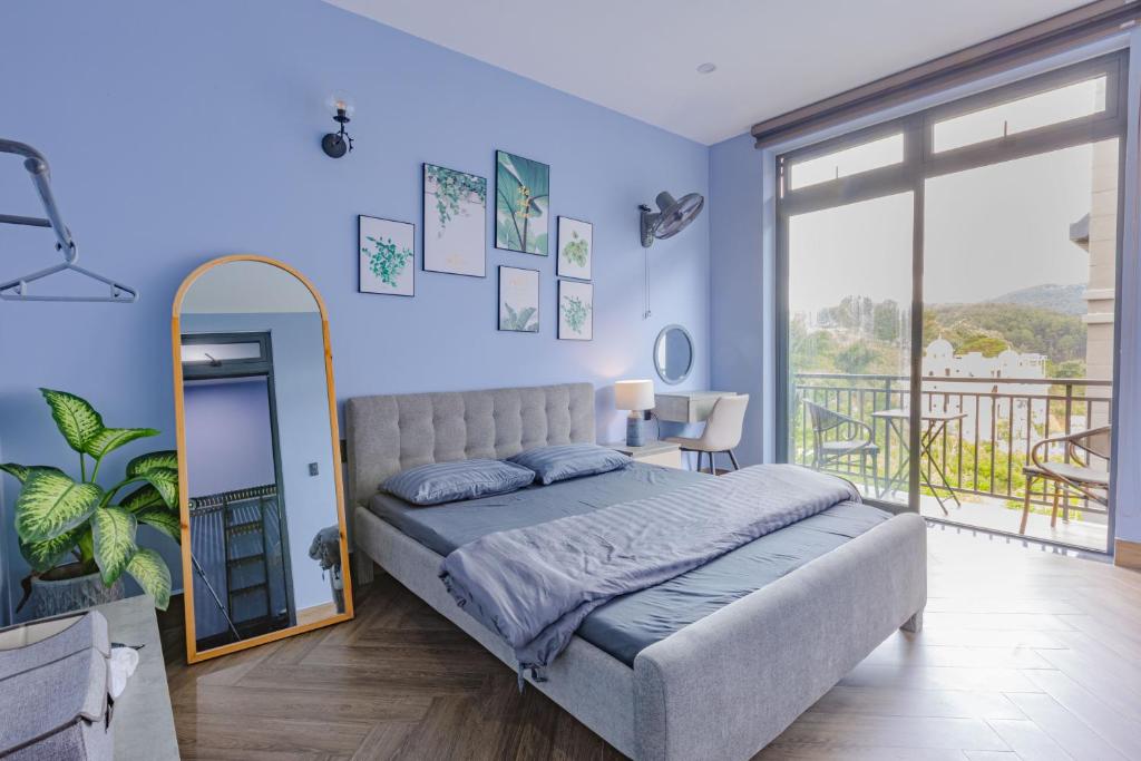 Giường trong phòng chung tại Green House - Căn hộ có bếp riêng
