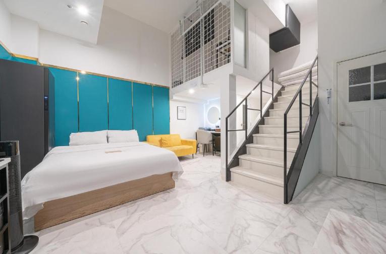 Postel nebo postele na pokoji v ubytování Arentz Hotel