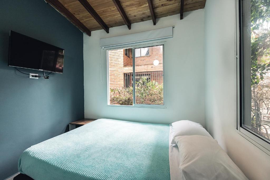 Postel nebo postele na pokoji v ubytování Living Hotel