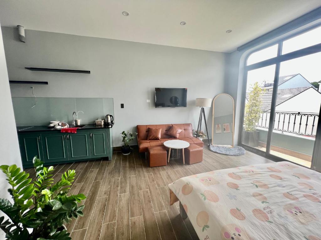 TV/trung tâm giải trí tại Green House - Căn hộ có bếp riêng