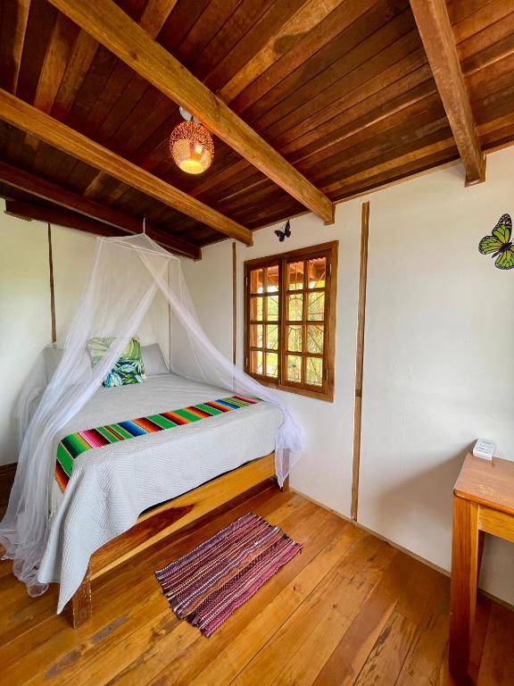 Postel nebo postele na pokoji v ubytování Pangea Lodge Tropical Vibe Home with Shared Pool