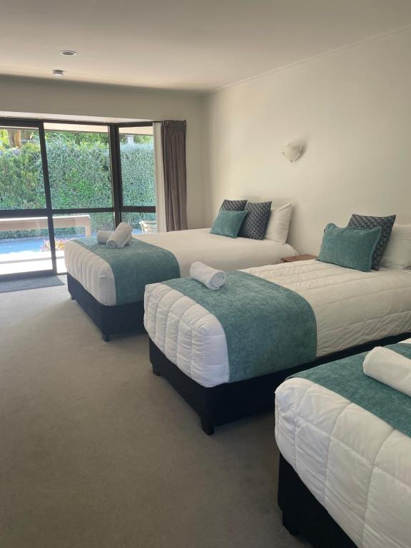 Letto o letti in una camera di Kingston TOP 10 Holiday Park
