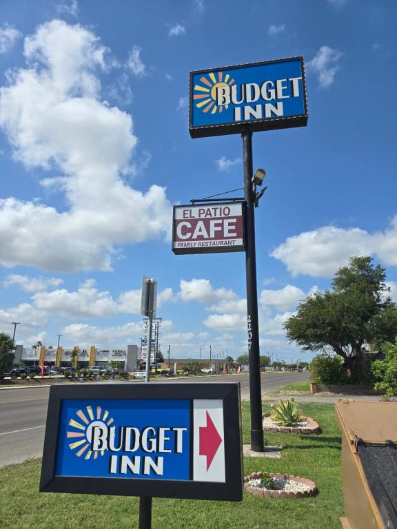 a sign for a buffet inn on the side of a road at Budget Inn Edinburg in Edinburg