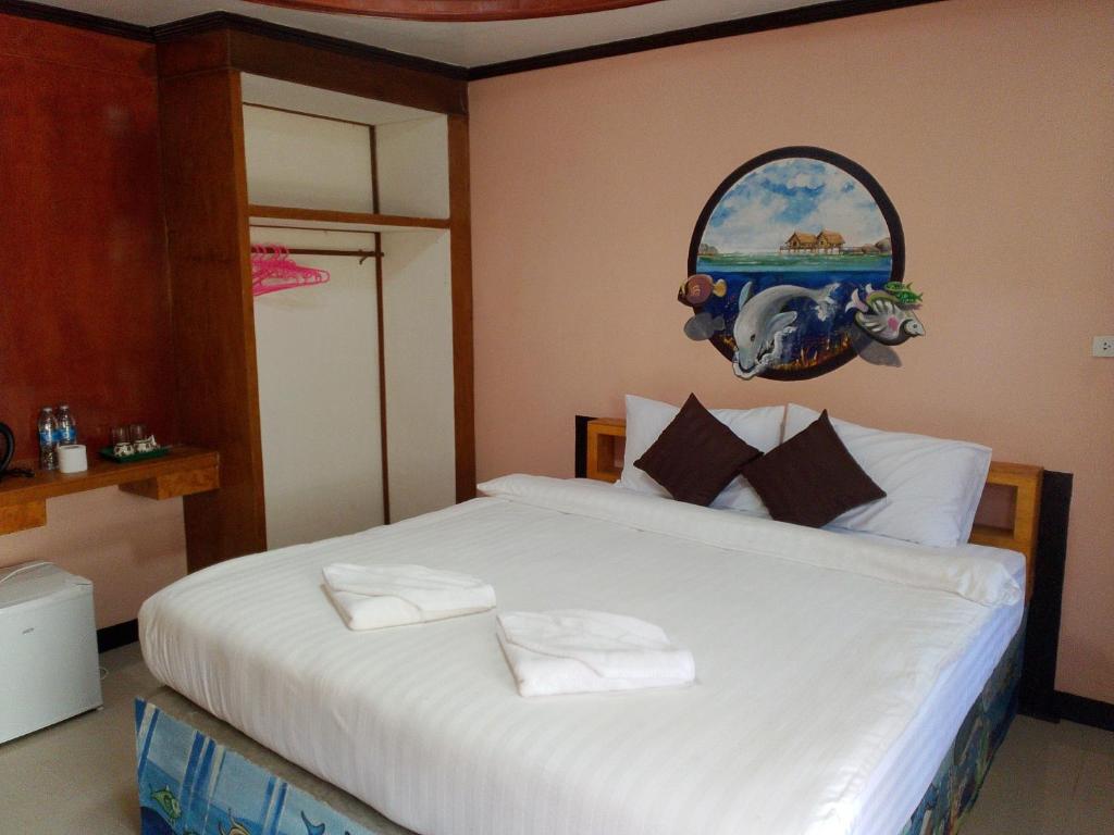 Postel nebo postele na pokoji v ubytování Baan Saitharn Koh Lanta