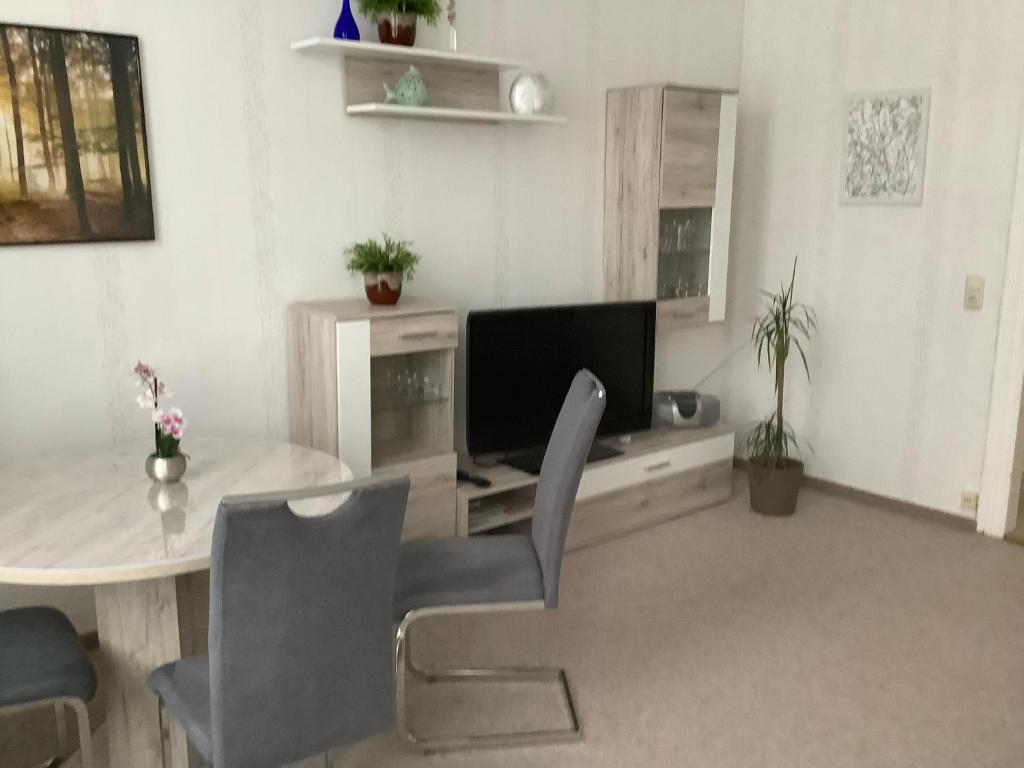 TV a/nebo společenská místnost v ubytování Ferienhaus Schuster