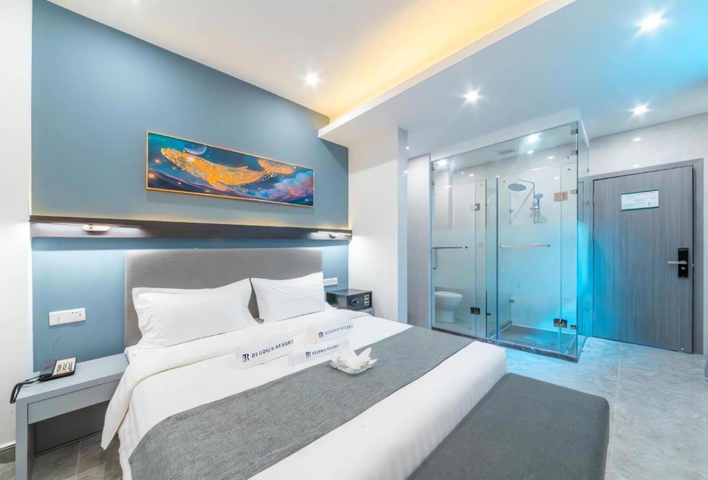 Postel nebo postele na pokoji v ubytování Bohol Panglao Begonia Resort