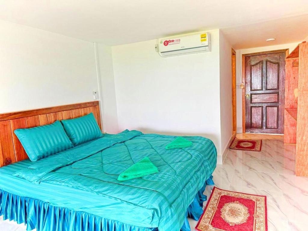 Postel nebo postele na pokoji v ubytování Soksan Natura Beach