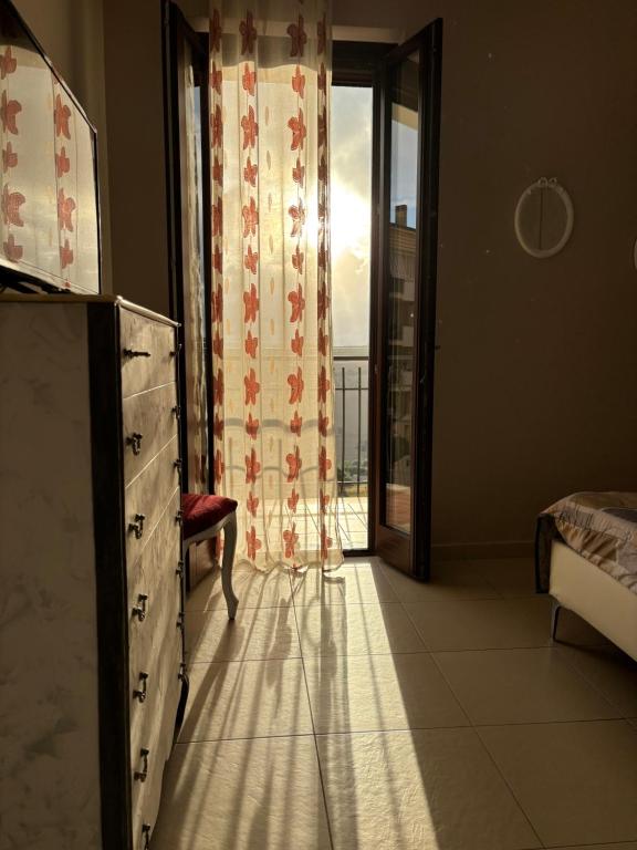 A bed or beds in a room at Massanè Casa Vacanza