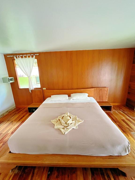 Postel nebo postele na pokoji v ubytování A-Na-Lay Resort Koh Kood
