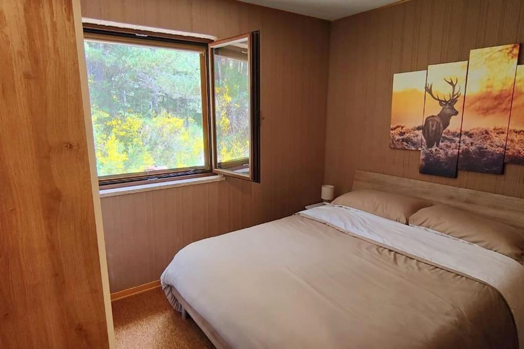 Postel nebo postele na pokoji v ubytování LORICAskiHOME